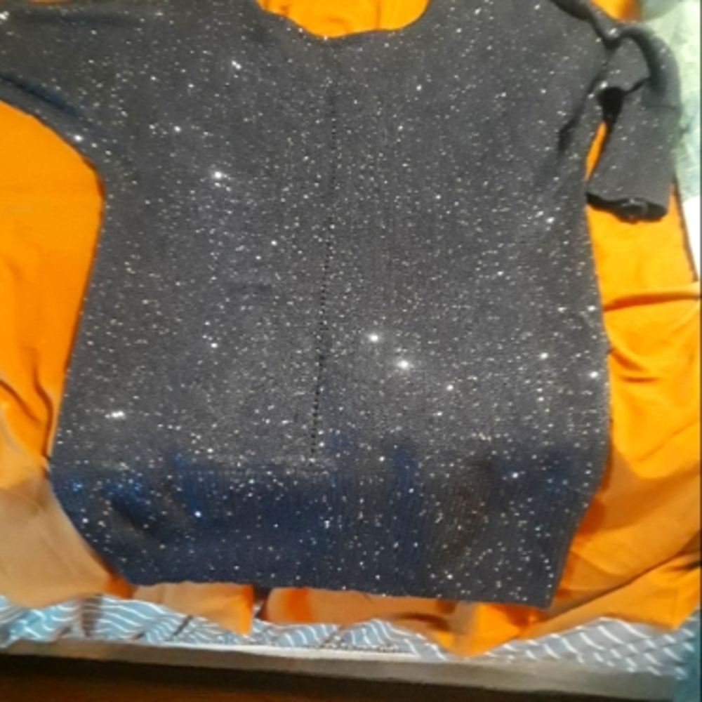 sweater ties in back